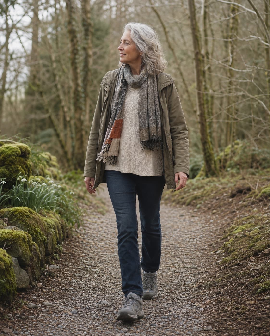 A woman enjoying a morning walk along a woodland path